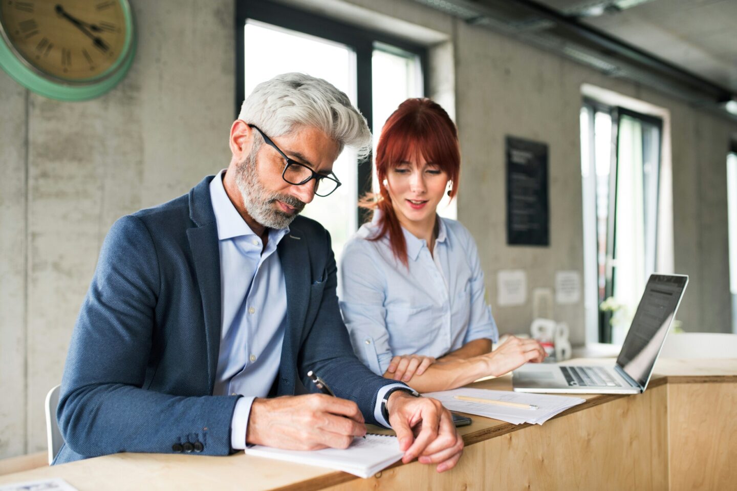 A lawyer and his paralegal provide legal support in India